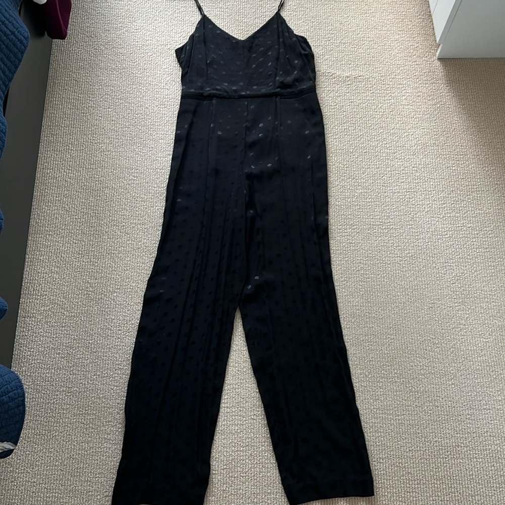 Black polka dot romper
